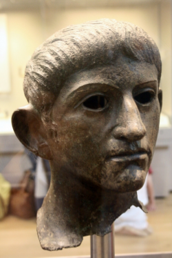 The head of a statue of Claudius found in Suffolk , believed to have been taken from the Temple of Claudius during Boudica's revolt. By Michel Wal ((own work)), CC BY-SA 3.0, https://commons.wikimedia.org/w/index.php?curid=6496434
