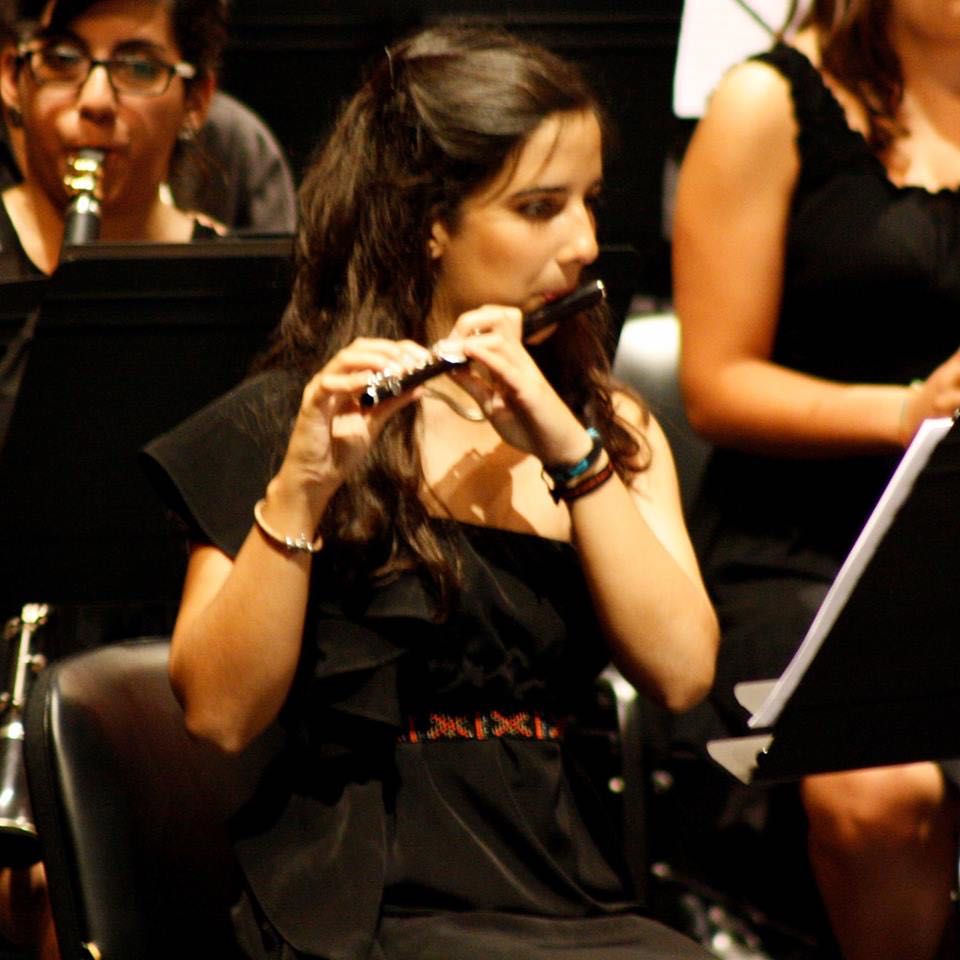  Catarina Rebelo Esteves,  ESART  Master’s graduate, in action with the school's Handmade Powell piccolo! 