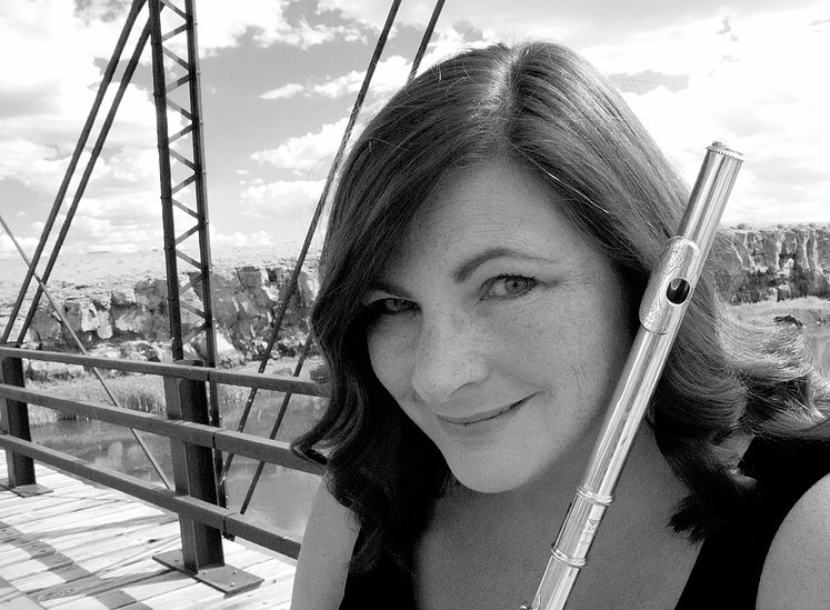 Powell Flutist Tracy Doyle, with a beautiful out-West, Colorado background