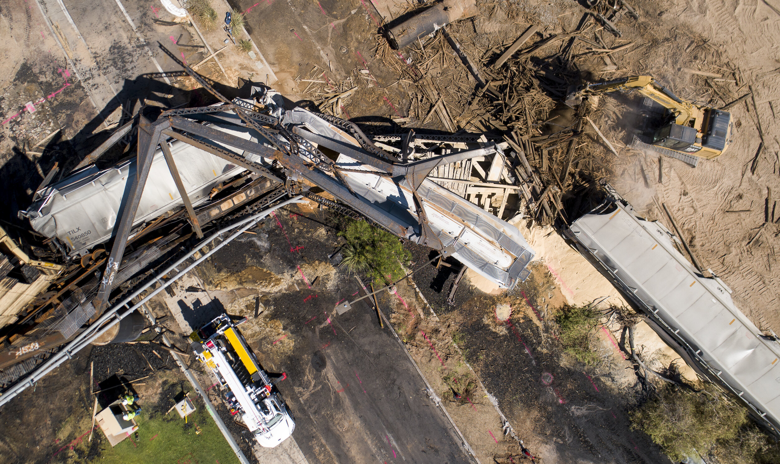  An aerial of the scene of a train derailment and bridge collapse at Tempe Town Lake.  