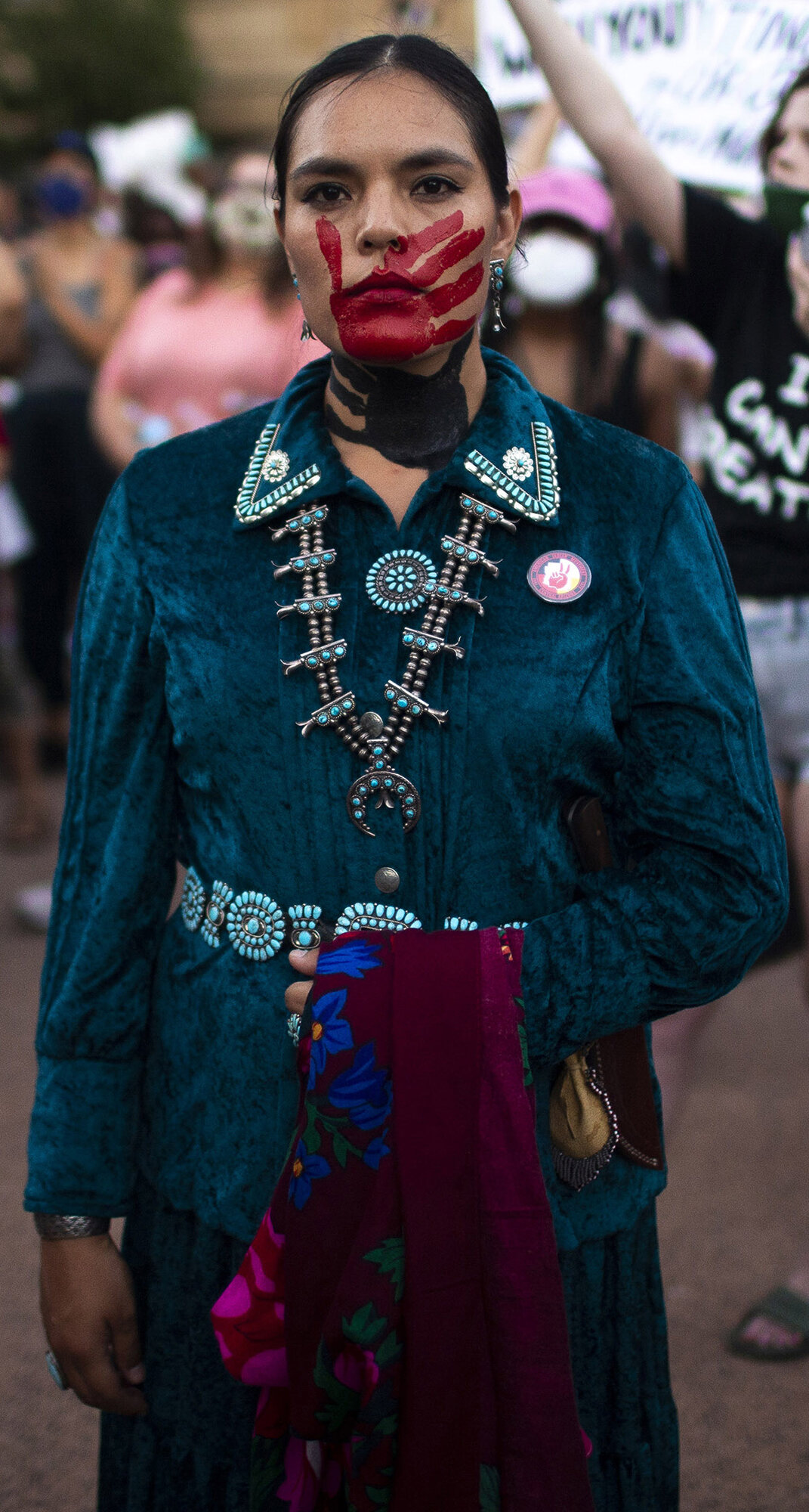  Danielle Goldtooh (center) poses for a photo while protesting with hundreds of people in downtown Phoenix as part of the tenth day of protests on June 6, 2020 on behalf of George Floyd, Dion Johnson, and others who were killed by police across the c