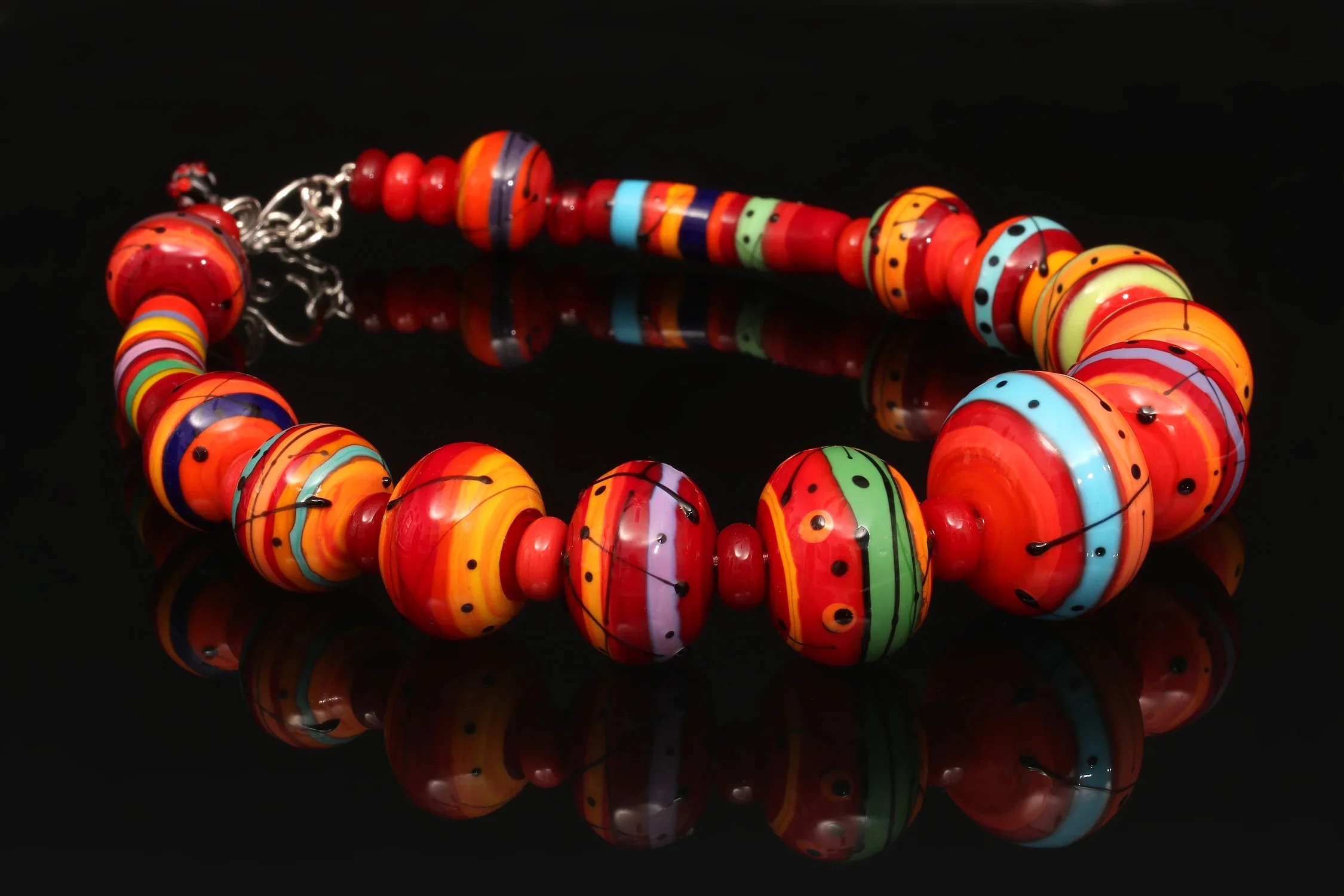 BethWilliams-Red+Fiesta+Hollow+bead++Necklace.webp