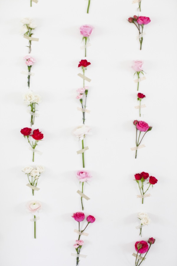 A fresh flower/washi tape wall, featured here at Style Me Pretty Living. 