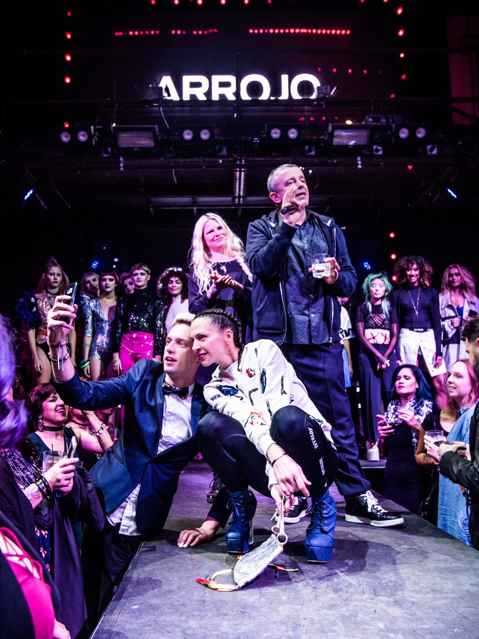 Nick Arrojo fires up the crowd as they invade the stage.