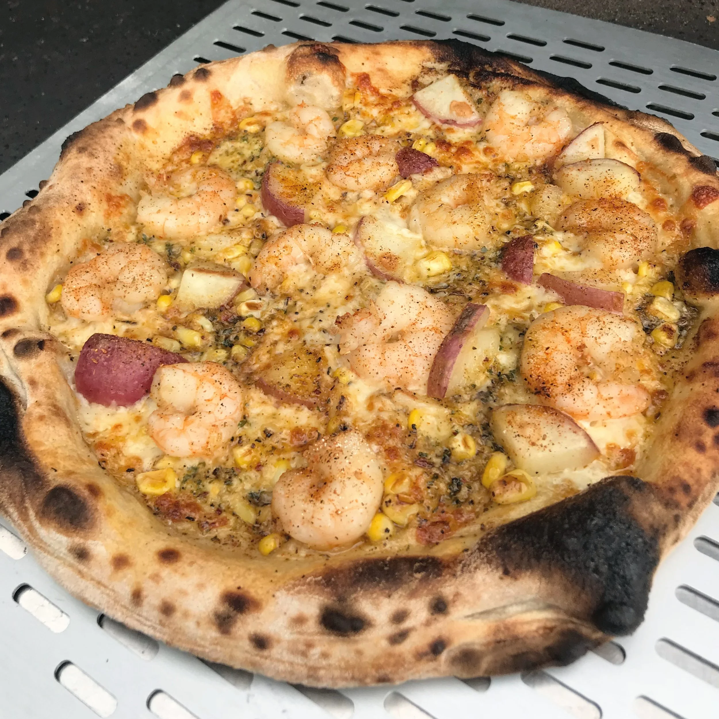 Dat’z a Shrimp Boil Pizza: Boiled Shrimp, Potatoes and Sweet Corn. This will be on the menu at the WhiteStar Market in Baton Rouge