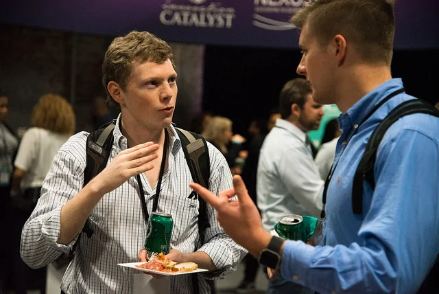 People enjoying Elysian Seafood at New Orleans Entrepreneur Week. Photo by Monwell Frazier .