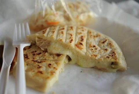 Sarita's Pupuseria pupusa. Photo courtesy of Thrillist .