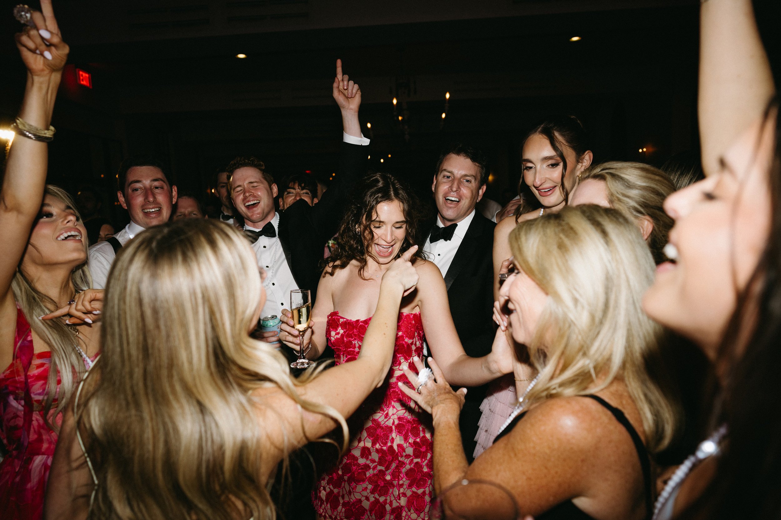 Missy dancing with guests during the reception.