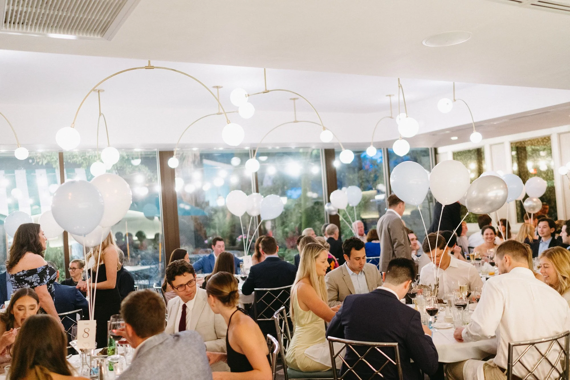Guests seated for the indoor wedding reception.