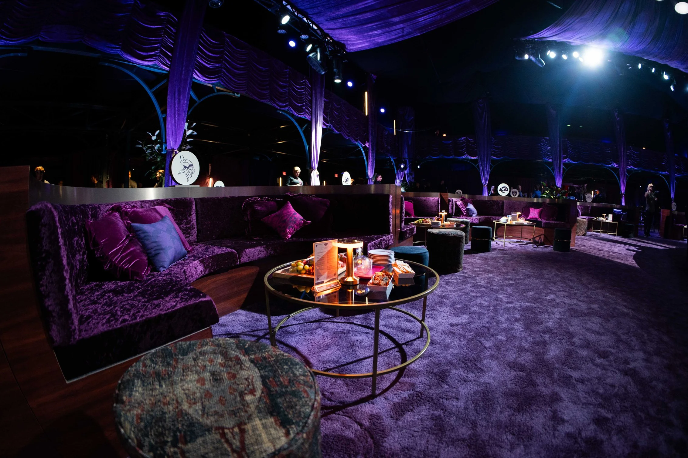 Lounge seating surrounding a colorful charcuterie display.