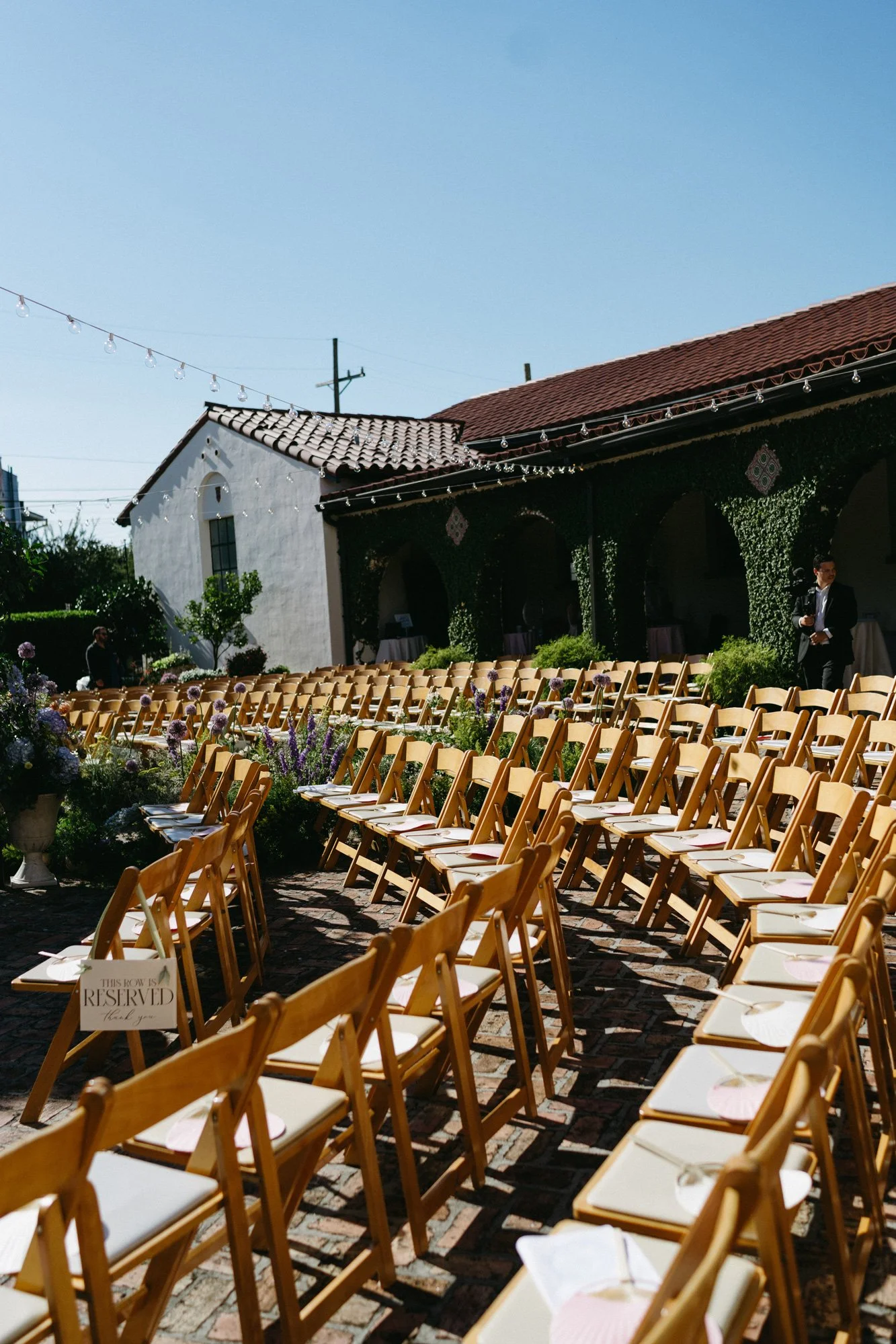 Wide view of the outdoor ceremony setup.