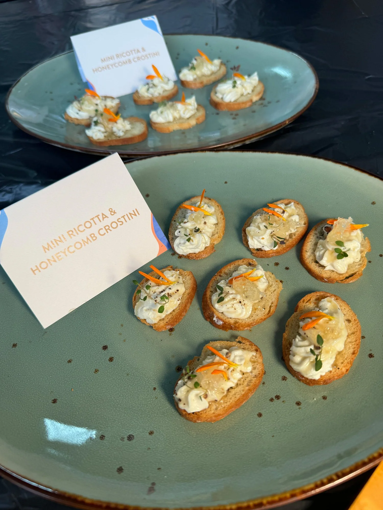 Mini ricotta and honeycomb crostini delivered a refined balance of sweet and savory flavors.