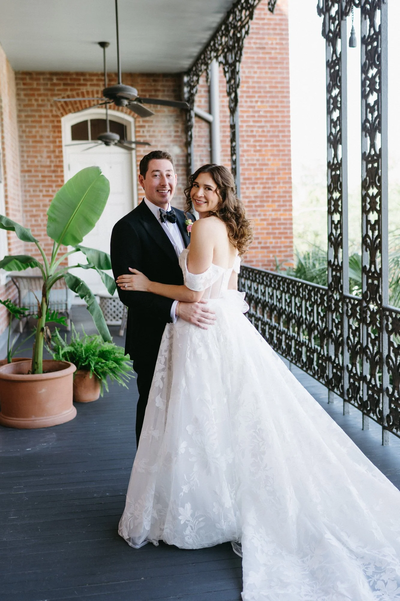 Portrait of Missy and Alec on the balcony.