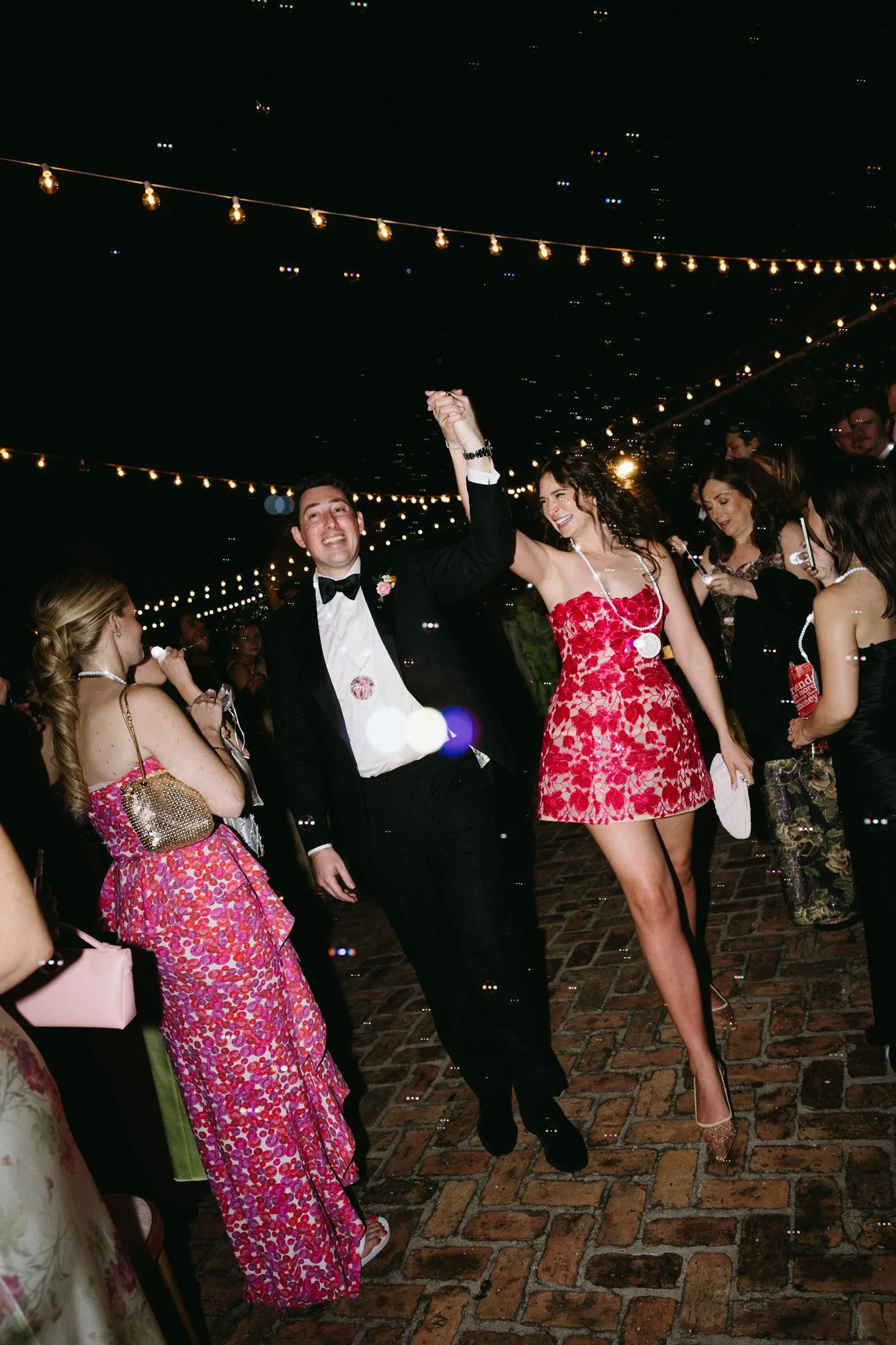 Bride & Groom dancing and celebrating at the wedding reception.
