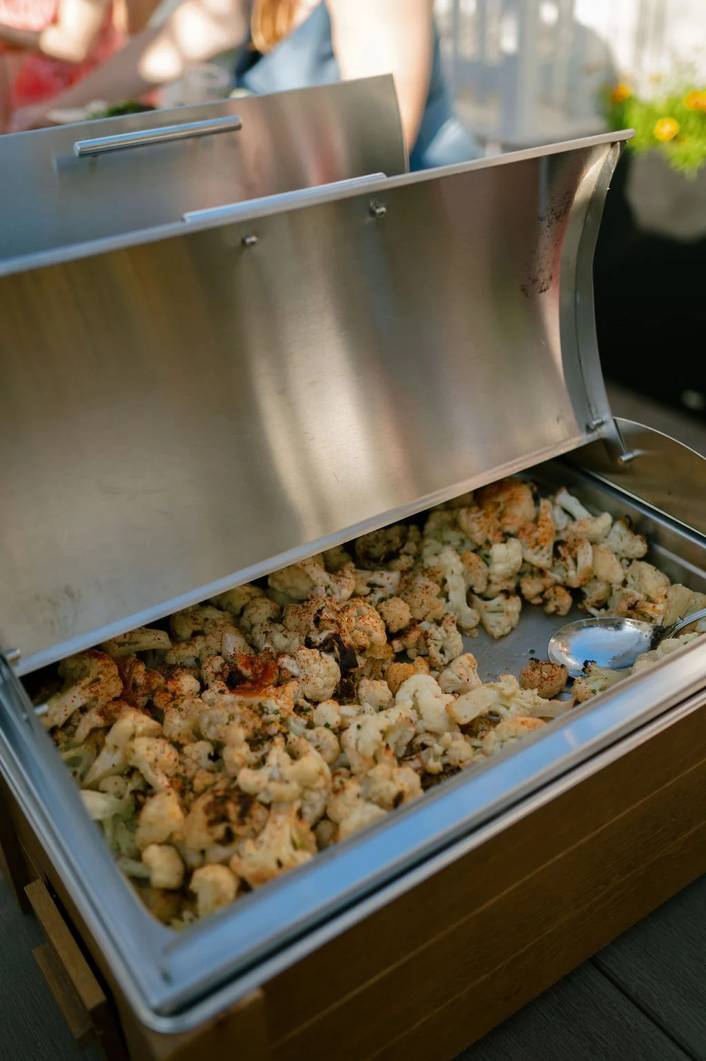 Buffet tray of roasted vegetables.