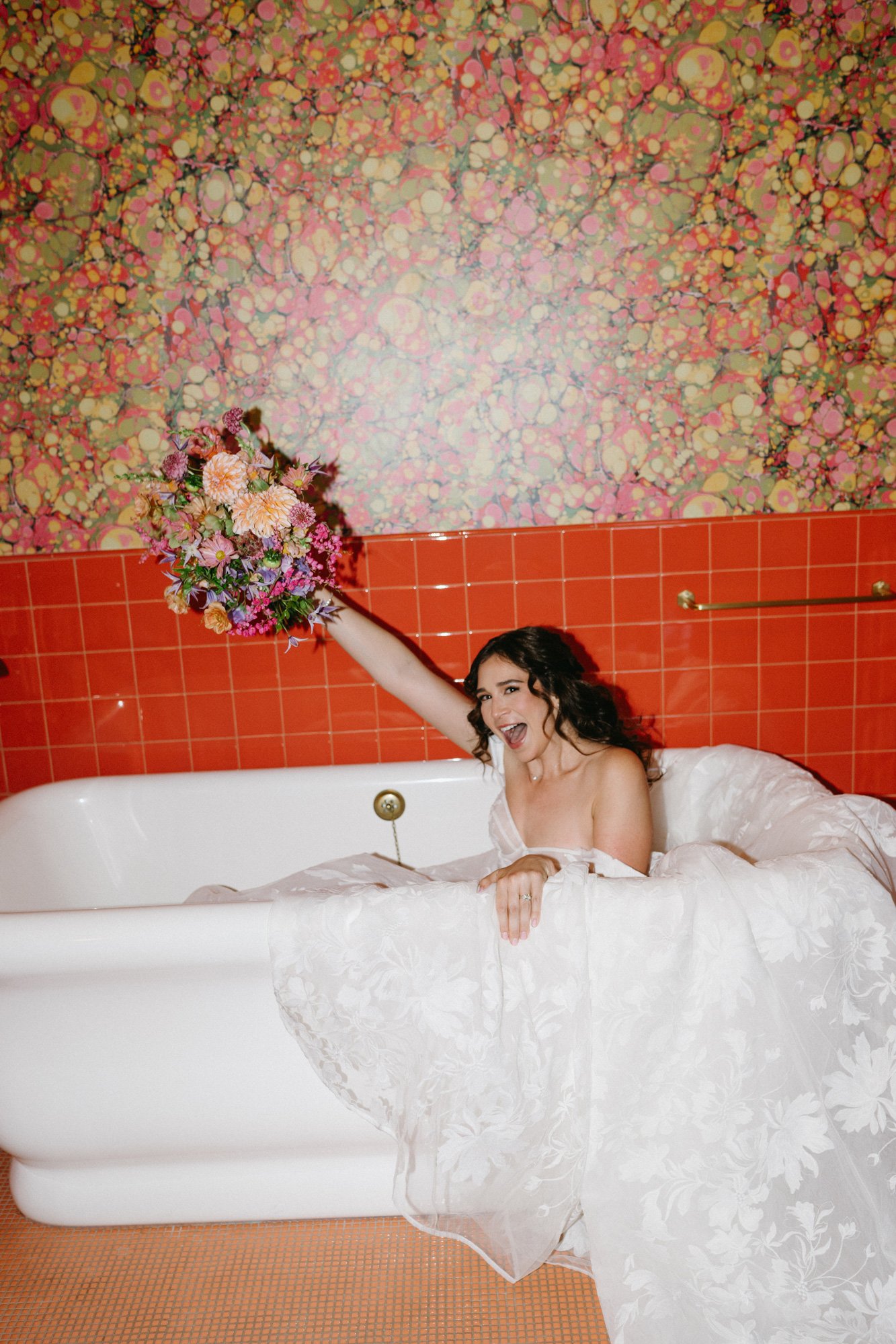 Missy posing with her bouquet.