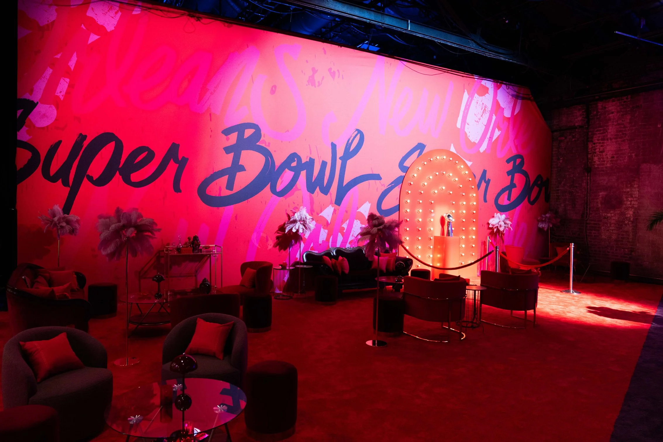 Live music stage with colorful Super Bowl LIX graphics.