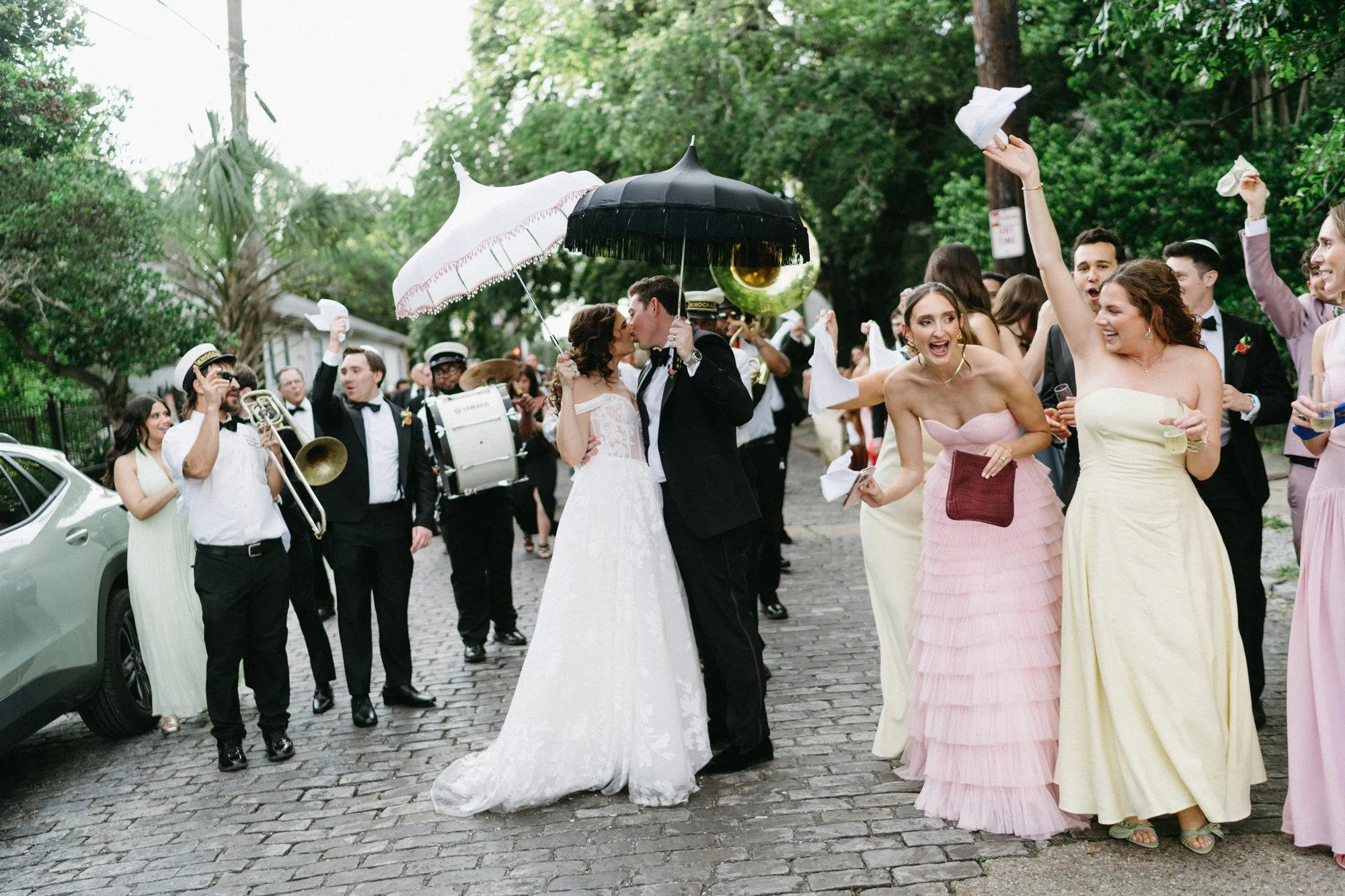 Missy and Alec surrounded by guests during the celebration.