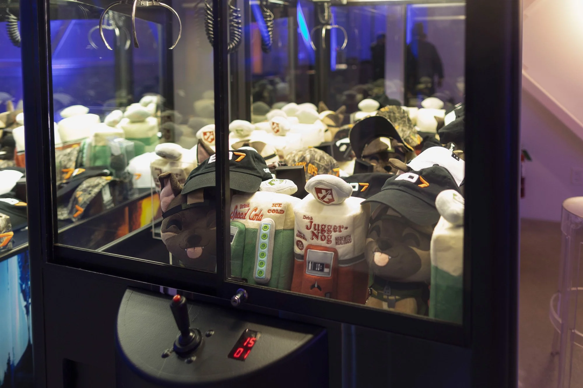 Custom prizes and branded merchandise turned every claw machine play into a memorable guest interaction.