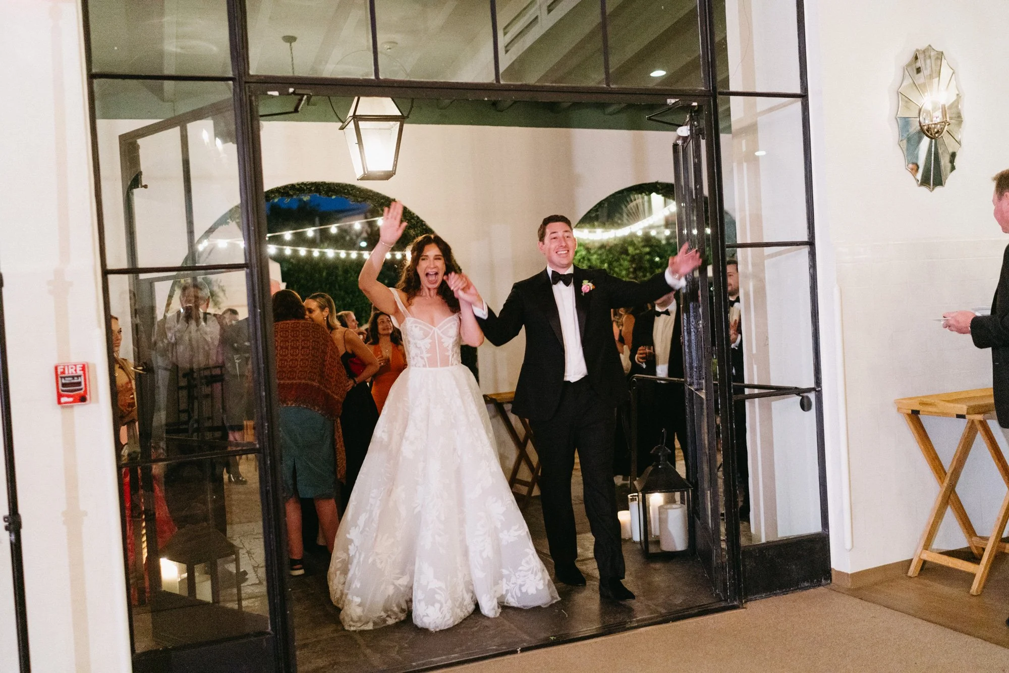 Missy and Alec make a reception entrance.
