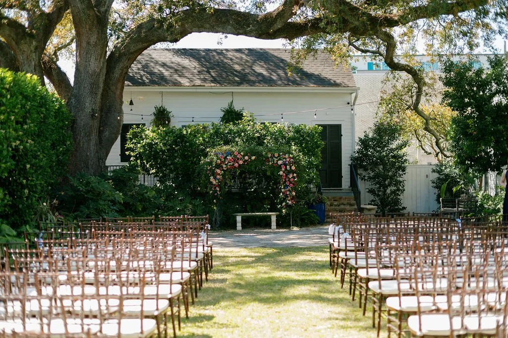 Ceremony seating arranged in The Mazant’s garden