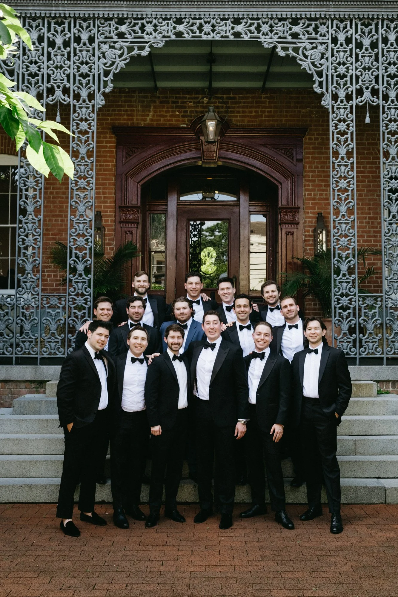 Alec and his groomsmen posing outside the venue.