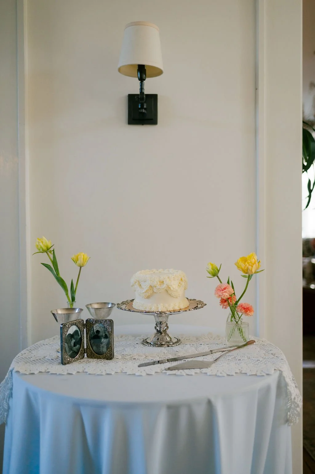 Wedding cake and floral display.