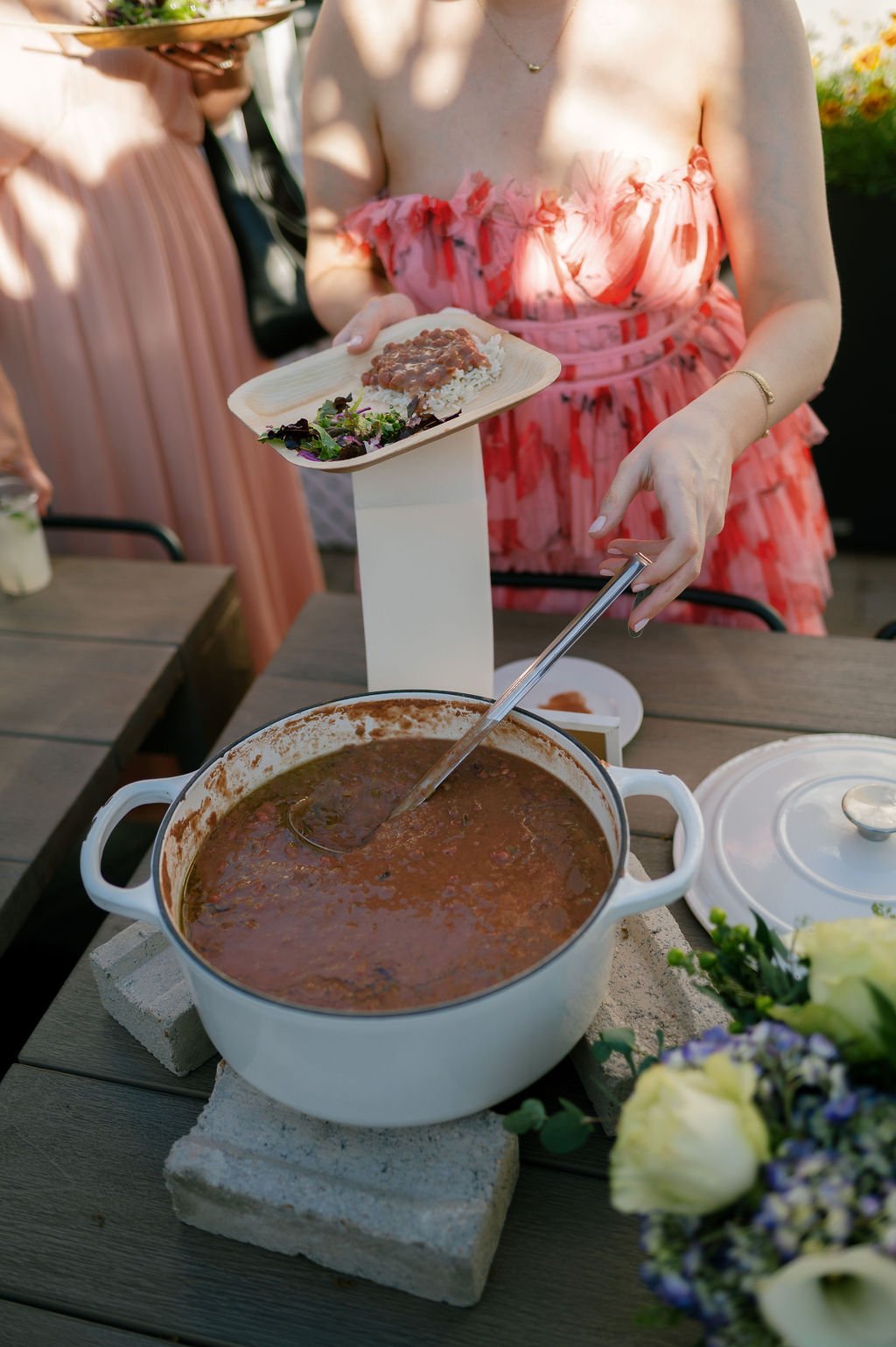 Warm dish being served from the buffet.