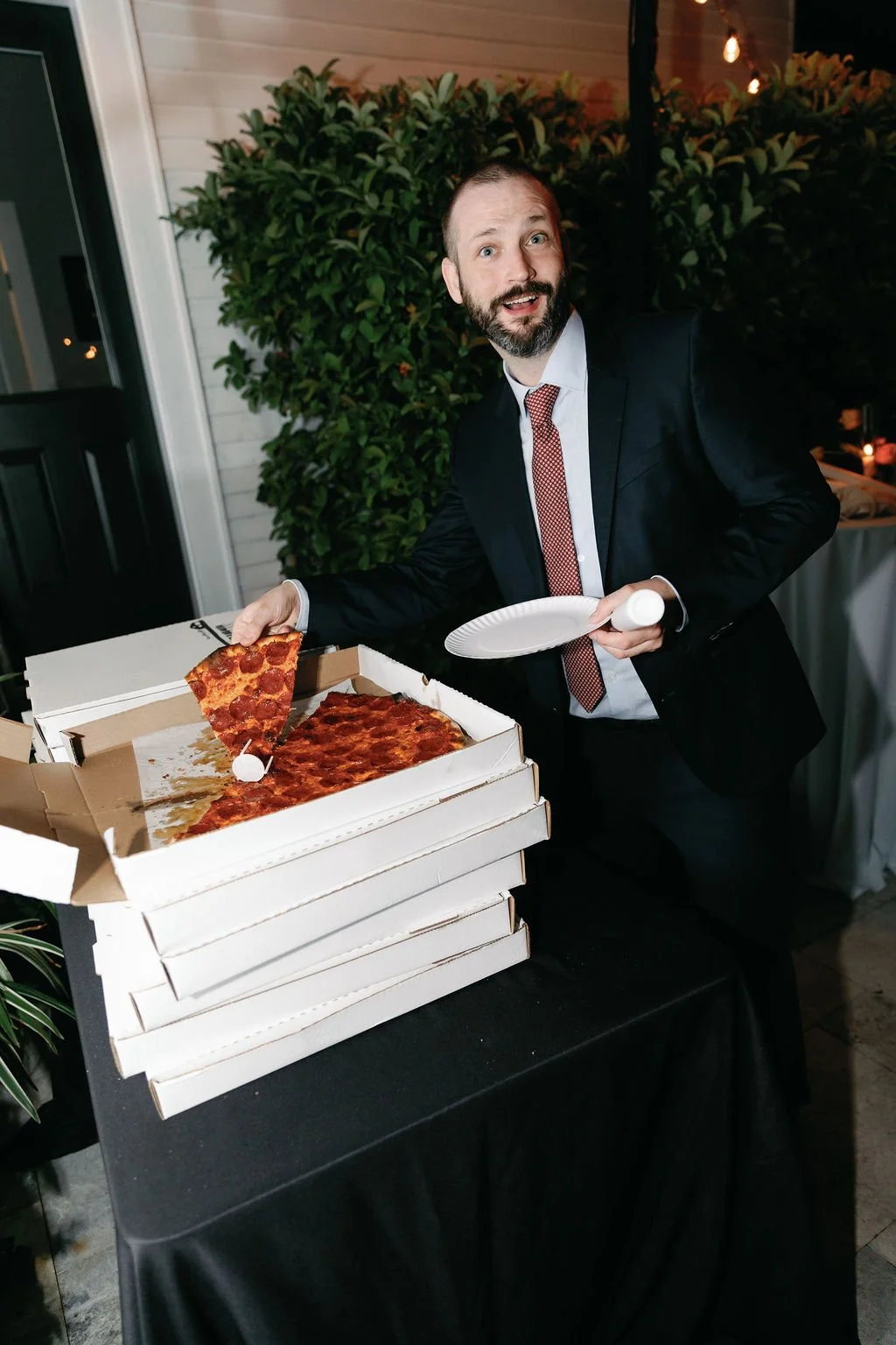 Late-night food being served to wedding guests.
