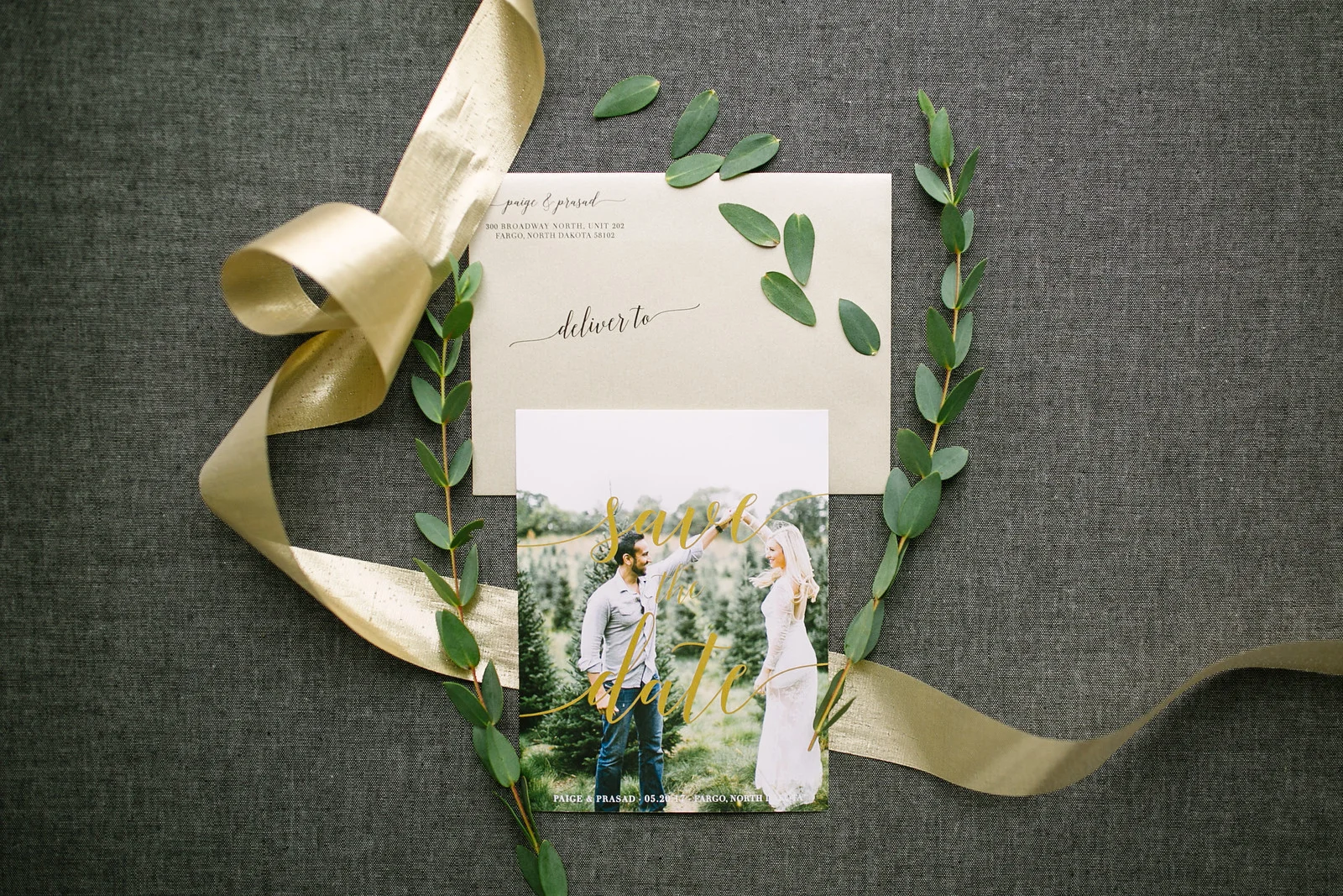 Gold script across a candid picture lends a elegant but carefree vibe to these beautiful save the dates!