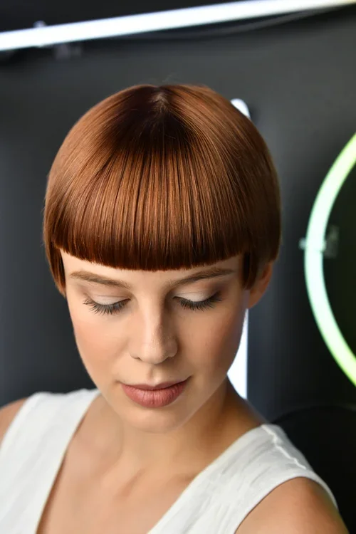 Copper bob with bangs.webp