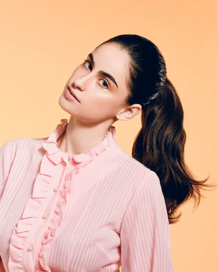 Brunette ponytail pink dress.webp