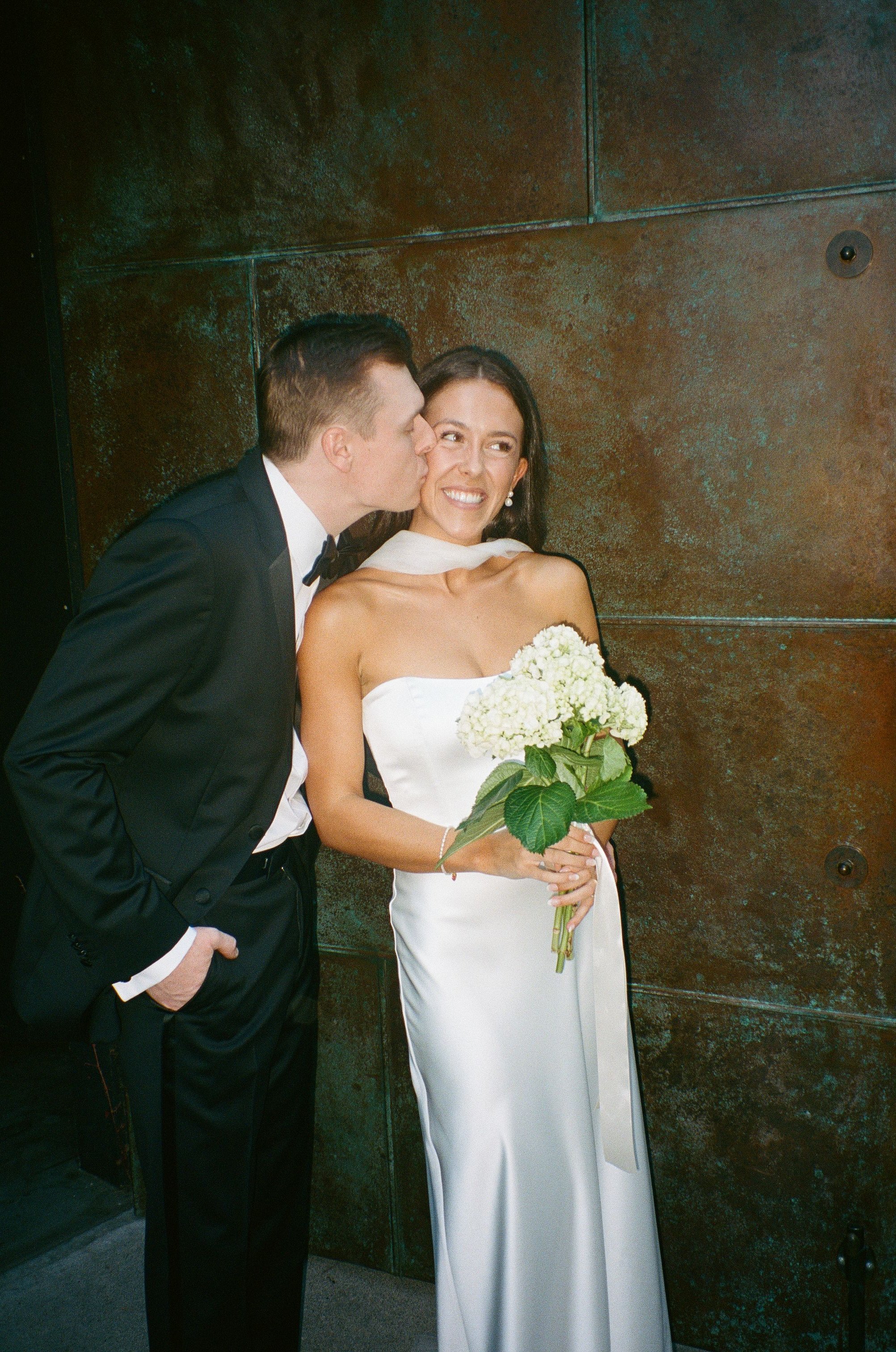 Bride and groom at JM Cellars in Seatte, Washtington