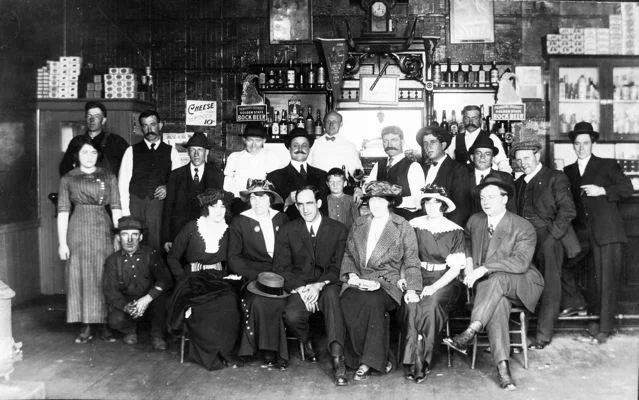I bet these guys were so proud about what they built. Behind the bar is Egidio Micheli and Palmiro Testa. Lady standing on left side is Eva Testa, Palmiro's daughter. Her future husband, Donald Day, is to her left.