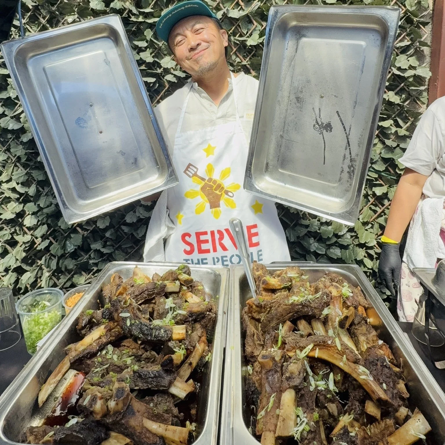 Artnelson Concordia holding his Batangueño Beef Rib Adobo