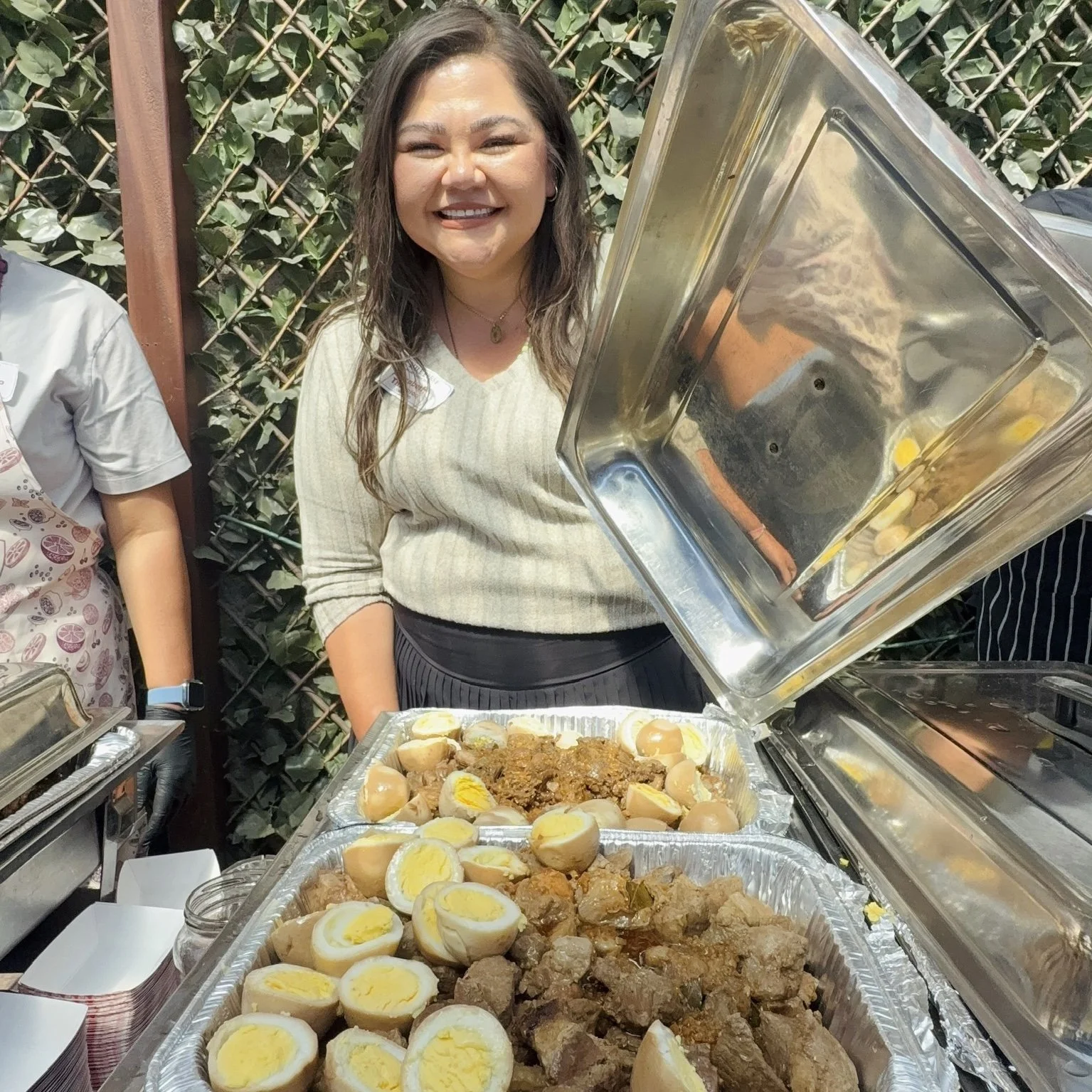 Elizabeth Thompson with her pork shoulder and egg adobo