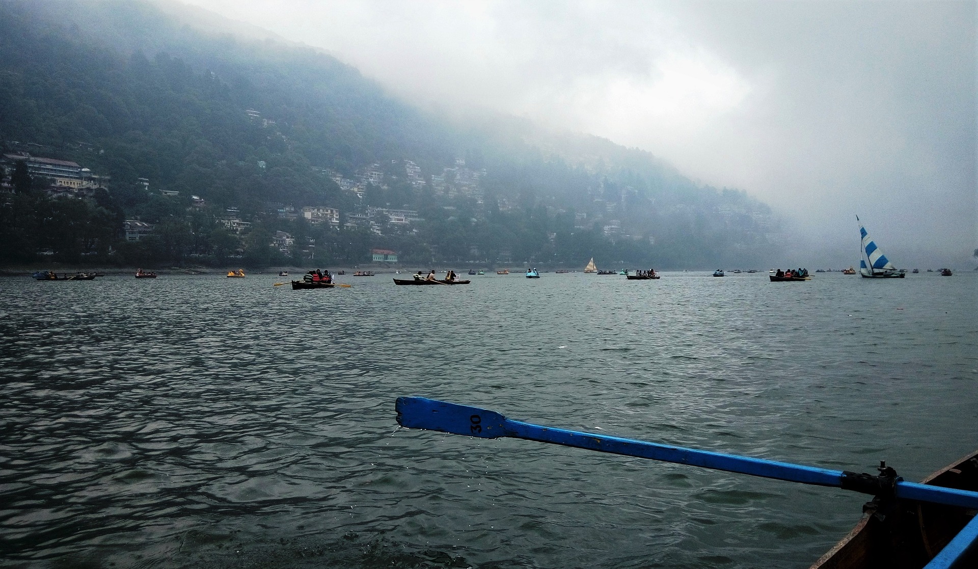 Try a spot of rowing on Nainital Lake.