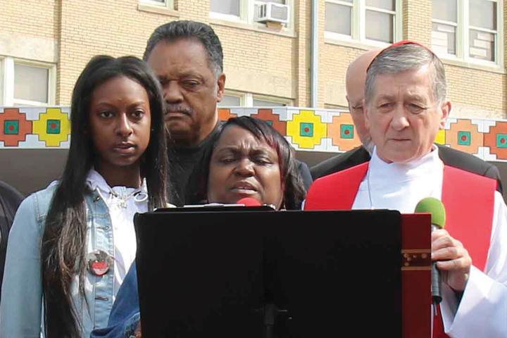 Domonique Jones pictured Left here with Jessie Jackson, Ruby Taylor from Taproots Foundation, and Cardinal Blase Cupich at a march for peace in Englewood in April of 2017.