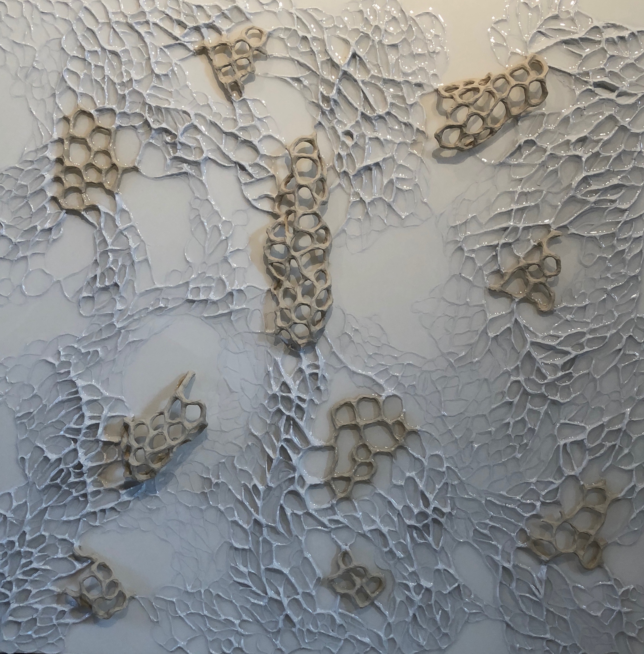 Things fall apart , 36 x 48 in., modeling paste, porcelain and resin.