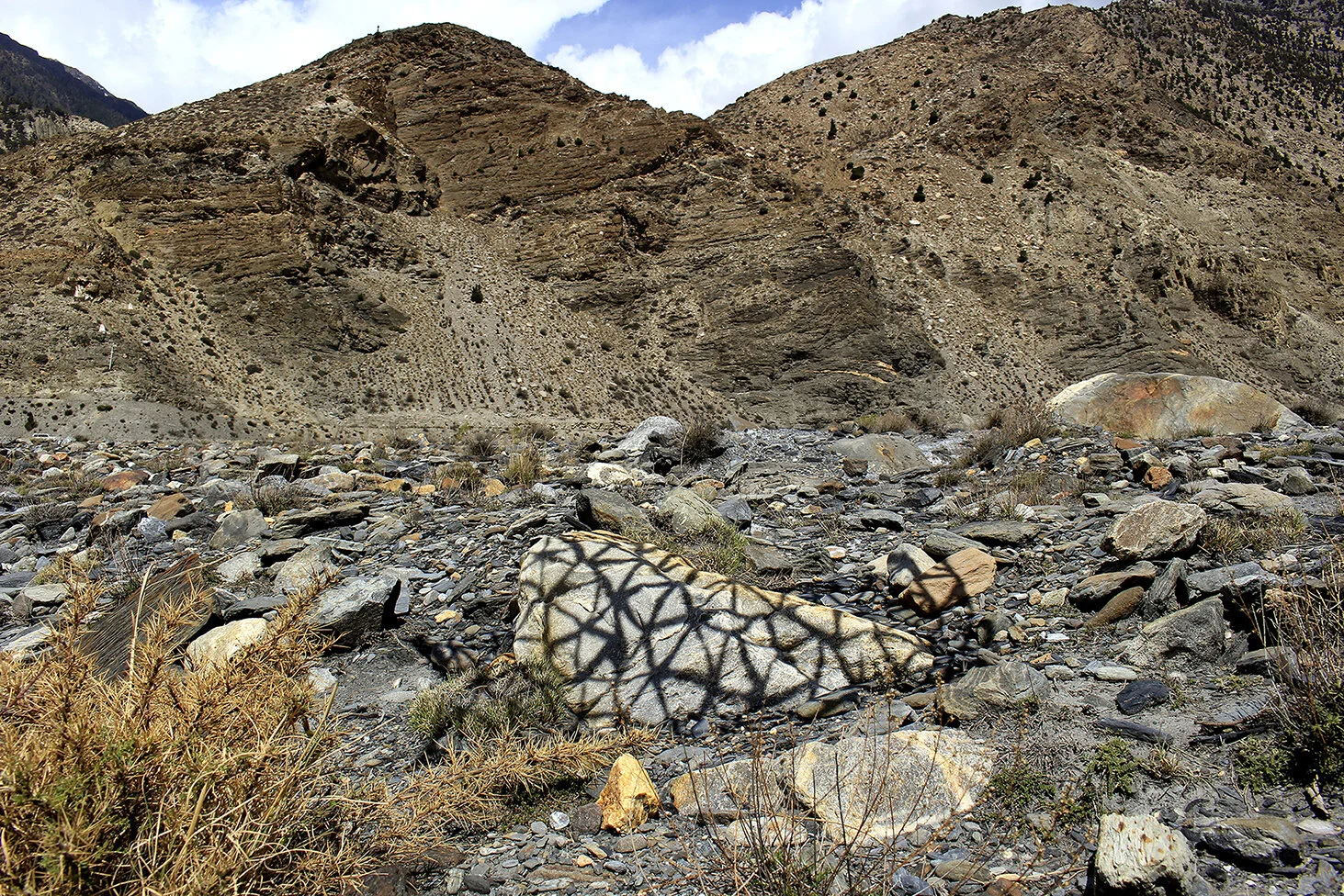 Wind Drawing Wind, Sunlight, Shadow, Dimensions Variable, 2018 Created during residency in Marpha, Nepal. Demonstrating the power of the wind by using sunlight to map shadows over various stones.