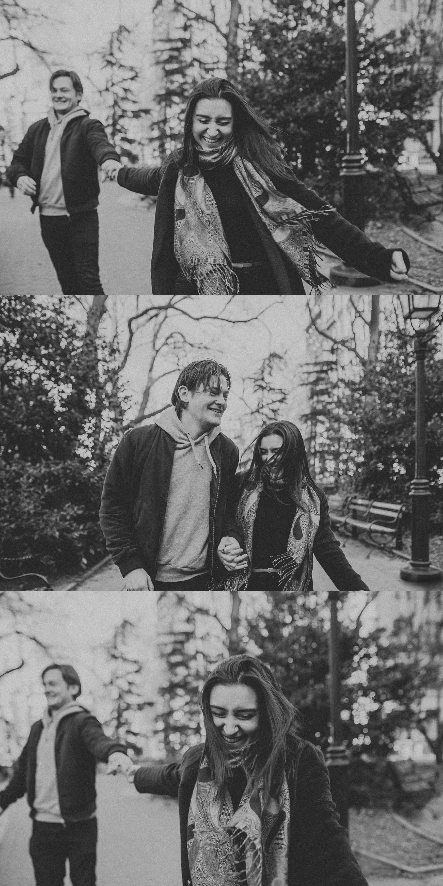 Couple running and laughing and having fun in Washington Square Park during engagement session in New York City, New York