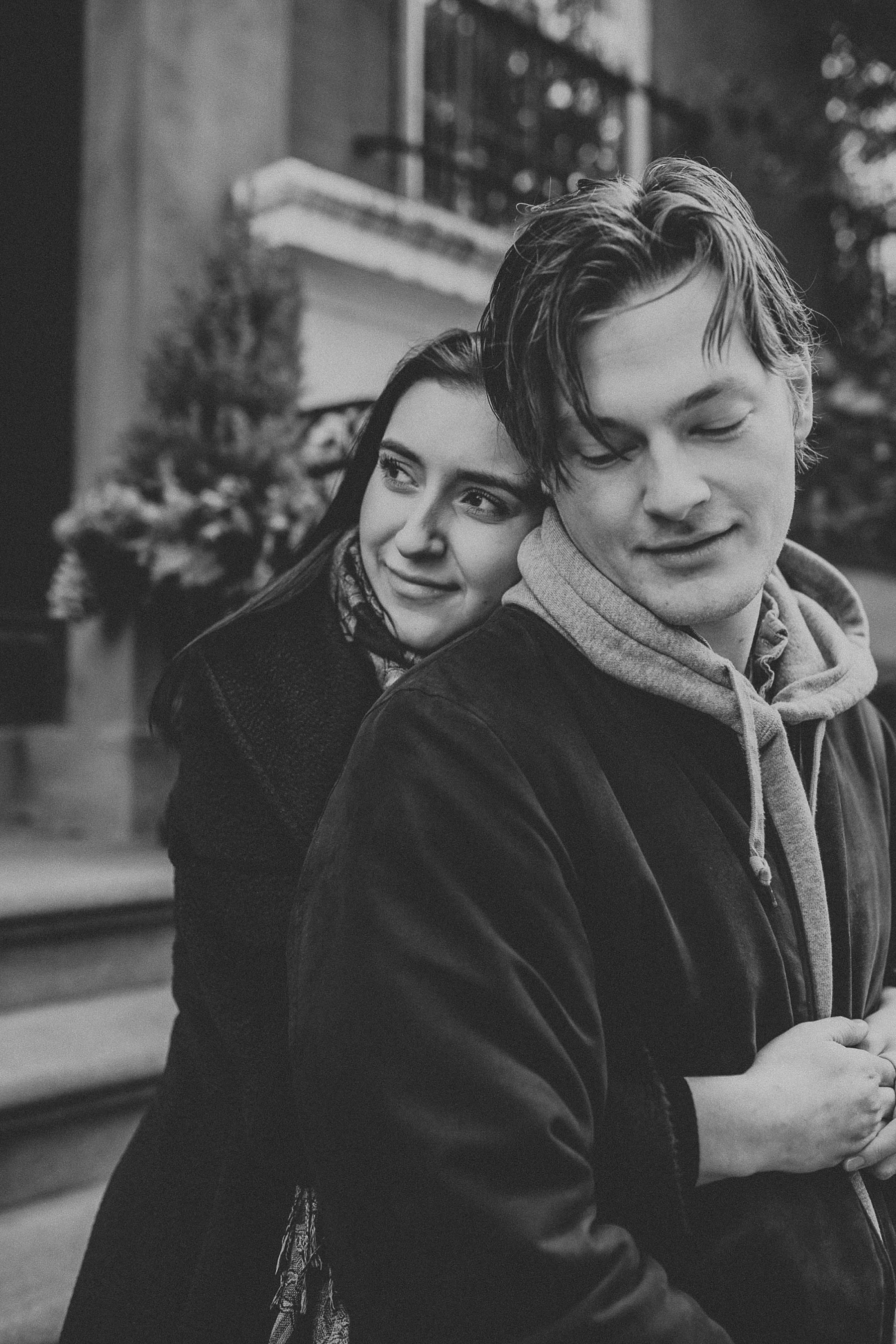 Couple having a quiet and reflecting moment together during engagement session in New York City, New York