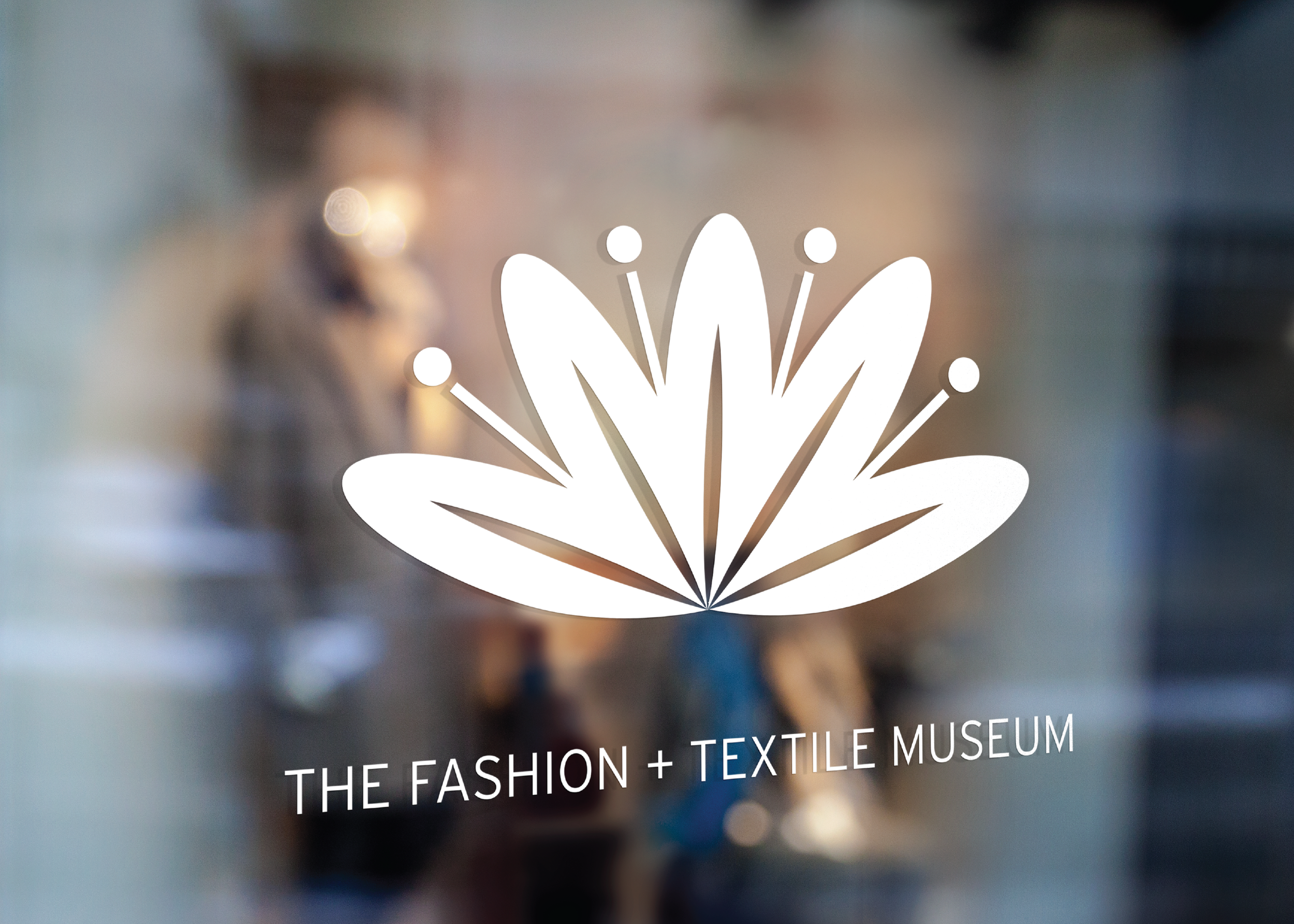 This logo reflects in many ways the playful and bold nature of this museum. The outward starburst emerging from the slightly floral motif symbolize the Fashion and Textile Museums' commitment to education and fostering community in the London metropo