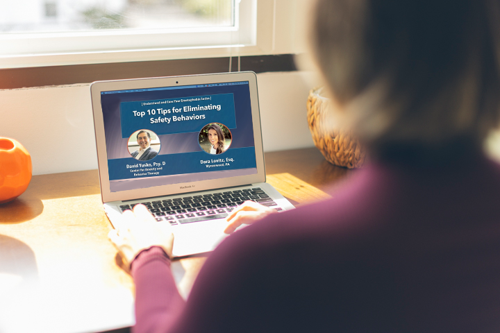 Emetophobe patient watches video from CABT on eliminating safety behaviors for emetophobia