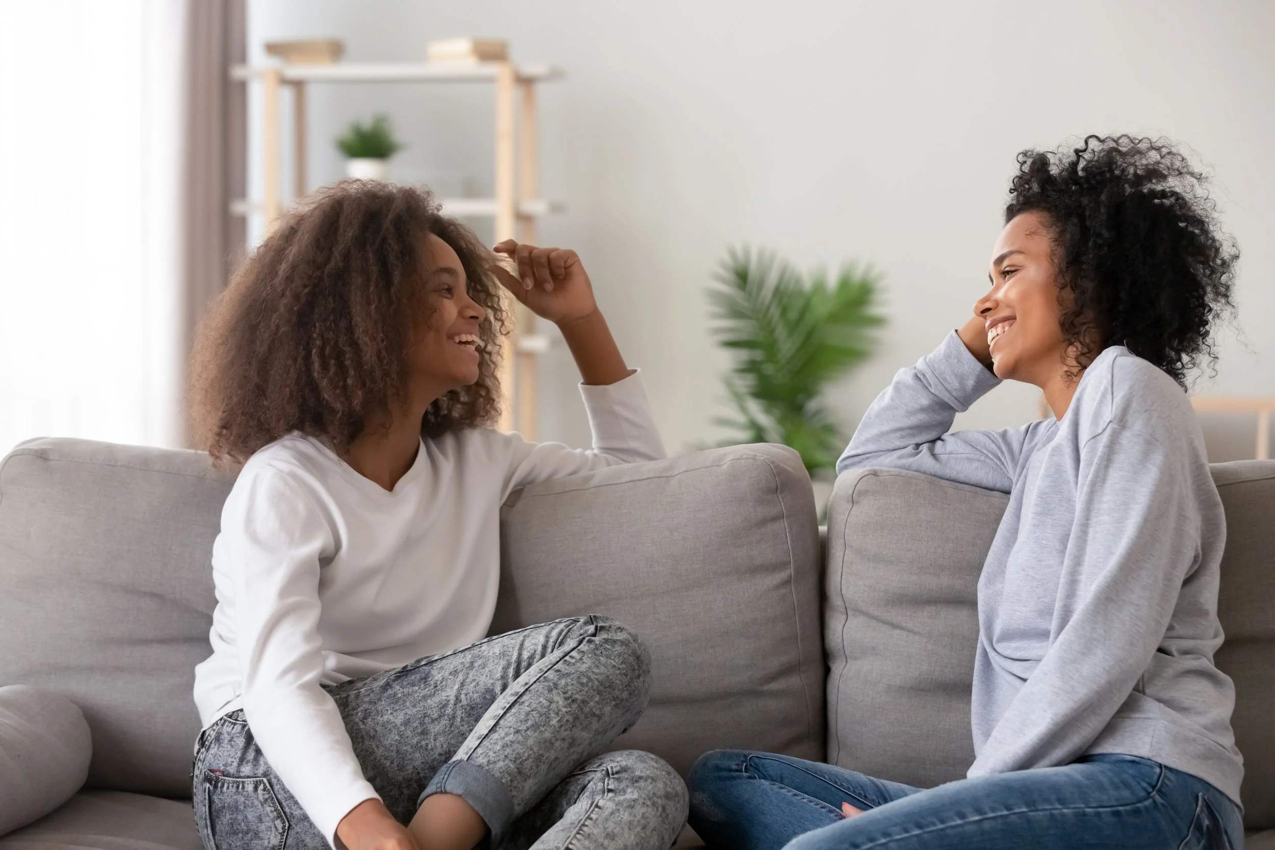 Parent and teenager having a supportive conversation about emetophobia and fear of vomiting