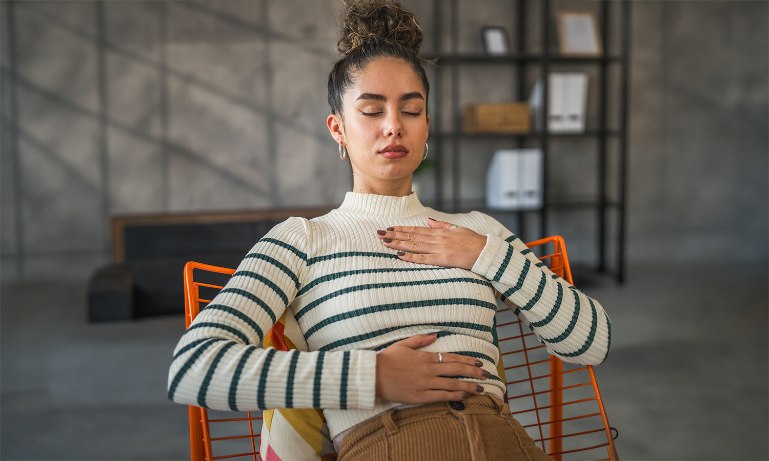Person practicing mindfulness meditation as part of maintaining long-term emetophobia recovery