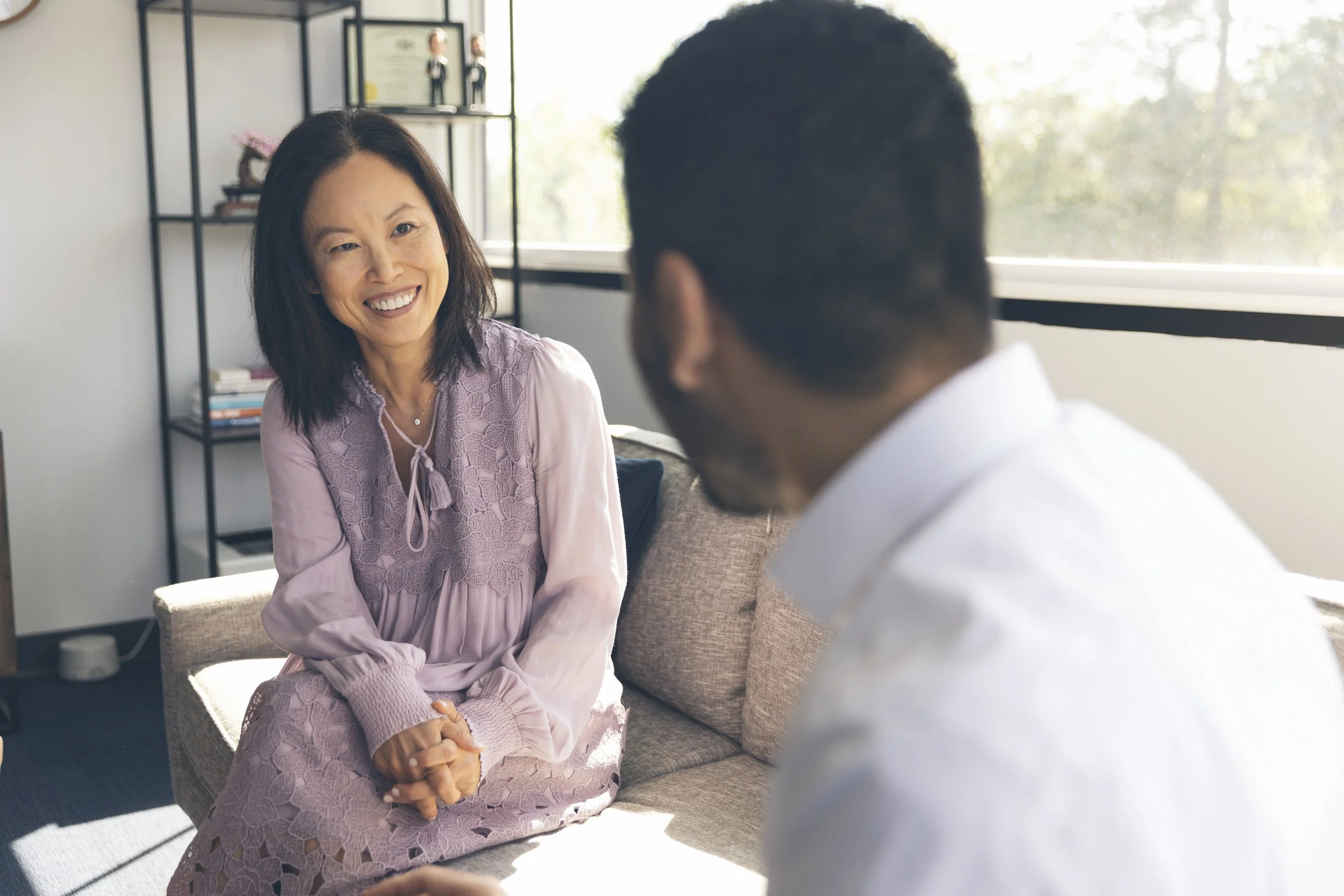 Clinician Dr. Steven Tsao meeting with client in therapy room at Center for Anxiety & Behavior Therapy to discuss OCD treatment