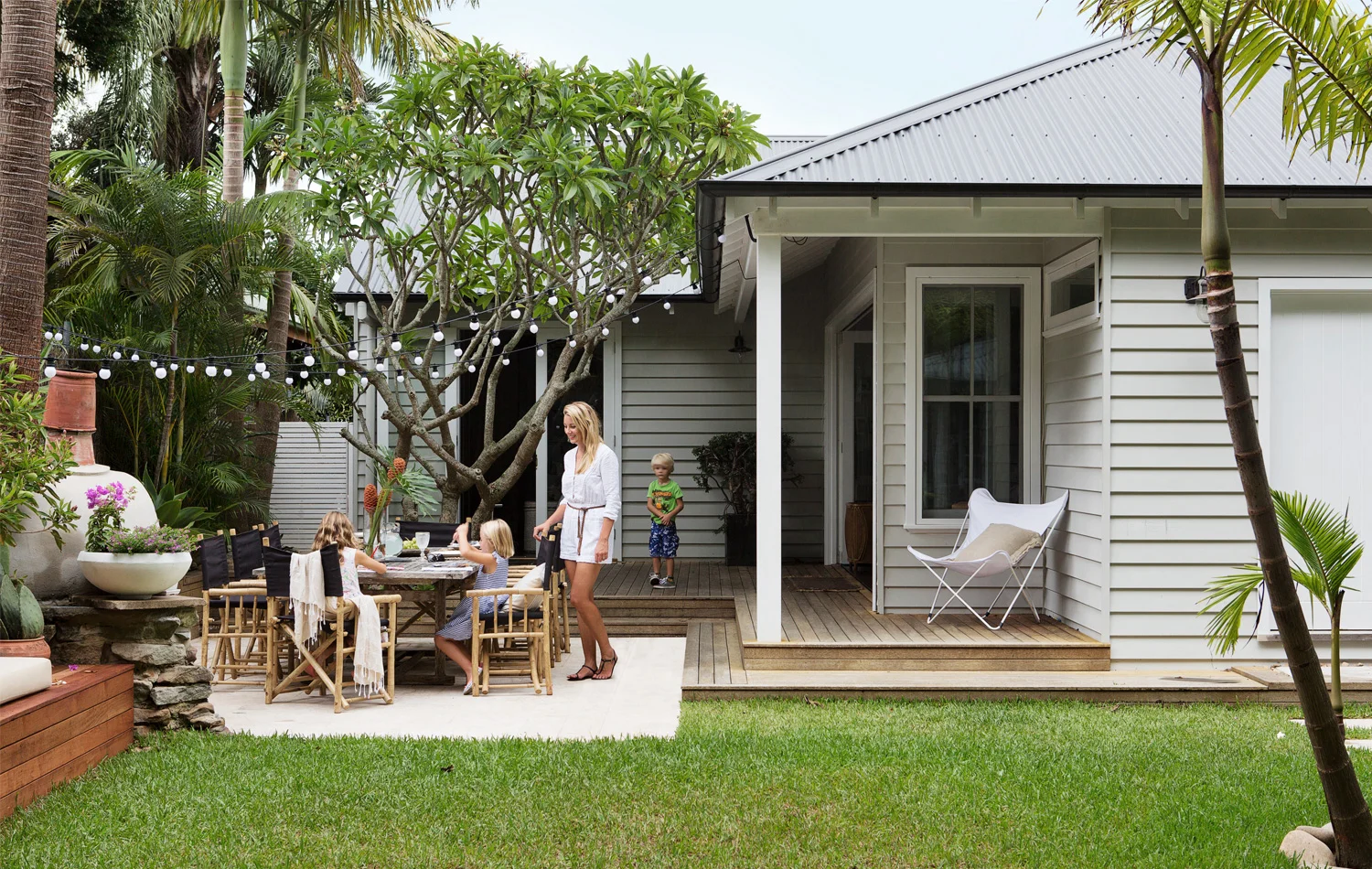 Owner Alanna Smit with her children (from left) Maisie, Penelope and Sam. Her husband Mike made the pizza oven. Photography by Simon Whitbread.