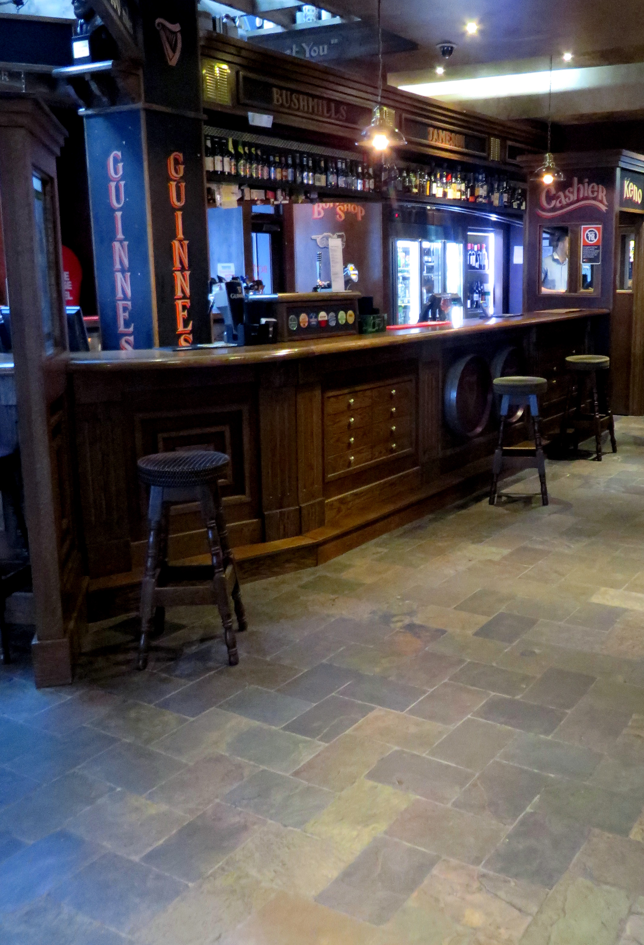Unsealed Rajah slate on the floor of the bar