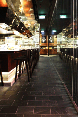 MOMOFUKU SEIOBO RESTAURANT, PYRMONT. It is an elegant, practical and durable surface that responds well to both natural light and specialty lighting used around the bar areas.